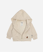 Casaco Moletom Bege Claro Bebê Criança Unissex MiniMalista Baby — look completo com bebê usando o casaco sobre body canelado + calça slim canelada Beige, formando conjunto de inverno monocromático. Do 0-3m ao 5-6 anos, menino ou menina.