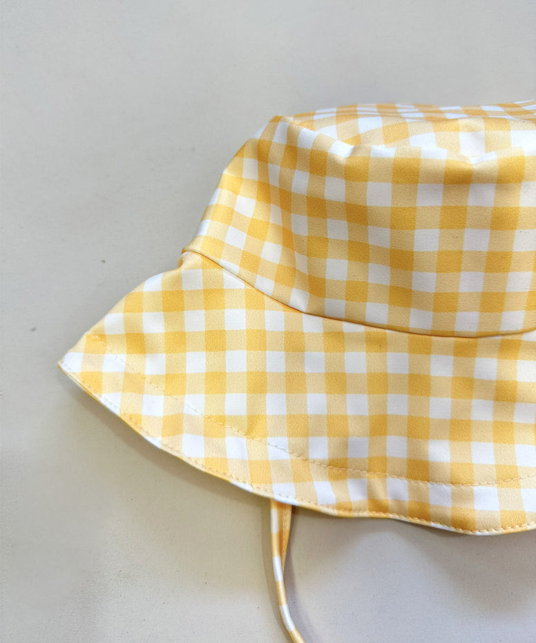 Chapeu-bucket-hat-praia-protecao-raios-uv-solar-piscina-bebe-crianca-verao-calor-vichy-amarelo-xadrez-amarelo-1.jpg