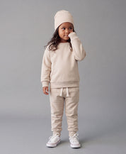 Conjunto Moletom Peluciado Liso Bege Claro em bebê MiniMalista — look coordenado unissex do Moletom Básico + Calça, Bege Claro atemporal, algodão premium peluciado por dentro sem sintéticos.