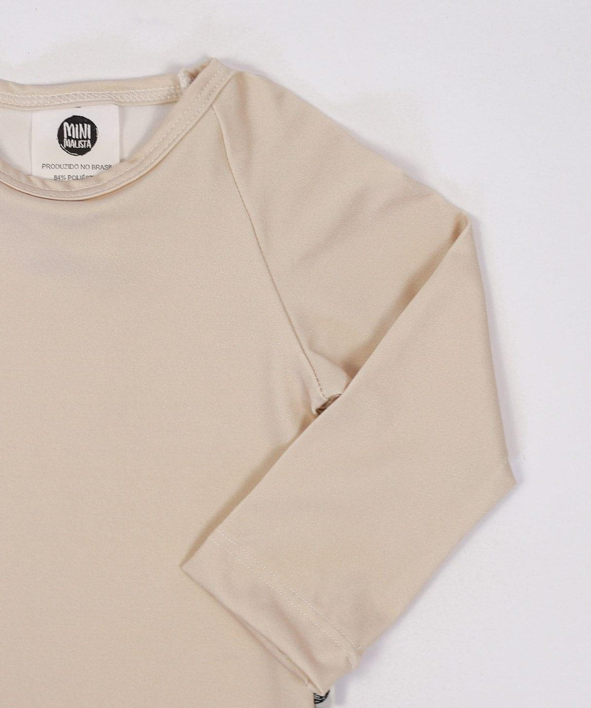 Camiseta Infantil Proteção Solar Unissex UV50+ MiniMalista | Liso Beige - MiniMalista Baby - 0, 0.3, b2b, black-friday, Calor, com-desconto-mm10, Menina, Neutro, tab-tam-camiseta-praia, tab-tam-camiseta-solar-praia, tab-tamanho-camiseta-raglan, Unissex, Verão -bebê-minimalista-estiloso